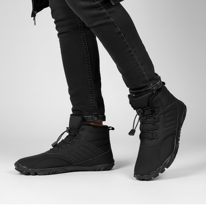 Anders waterproof winter boots on model against white background, side view