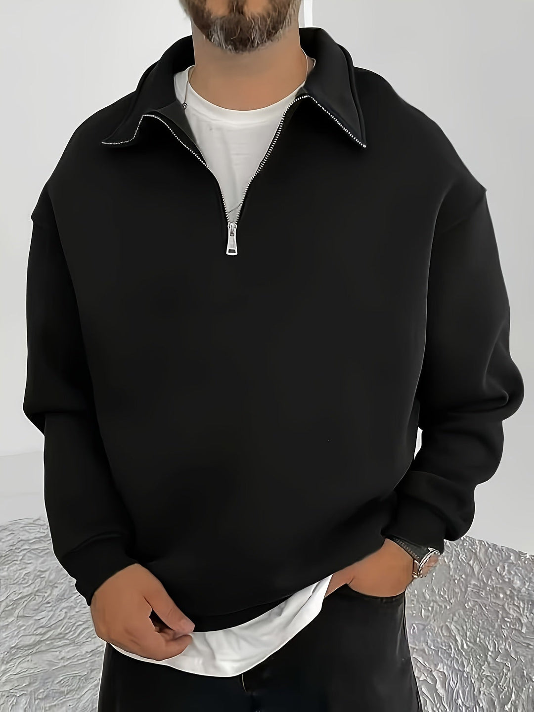 Barrett black quarter-zip pullover sweatshirt, front view on model