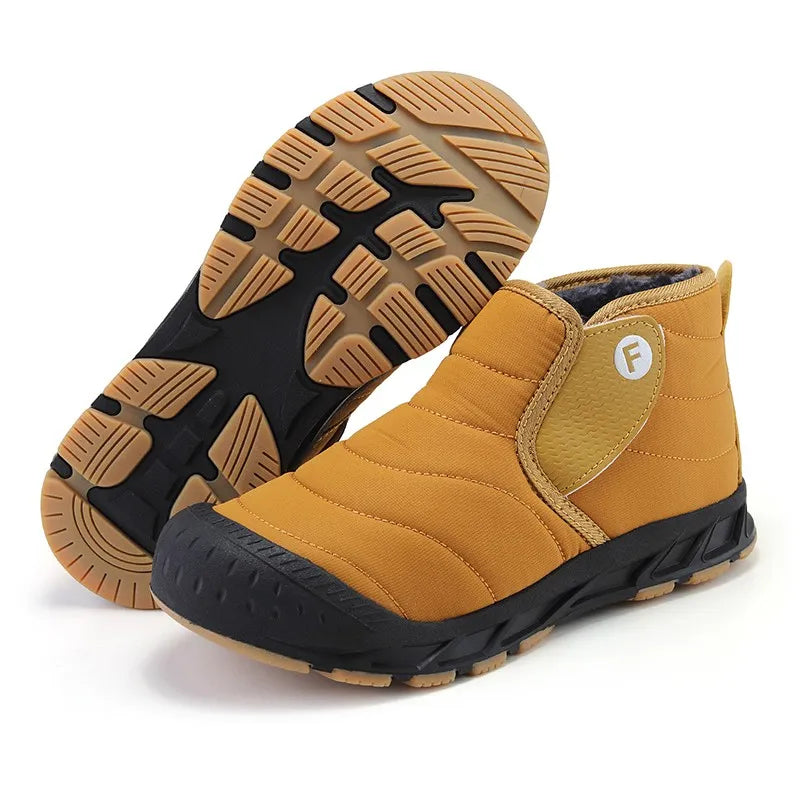 Callum snow boots in mustard yellow shown with textured rubber outsole