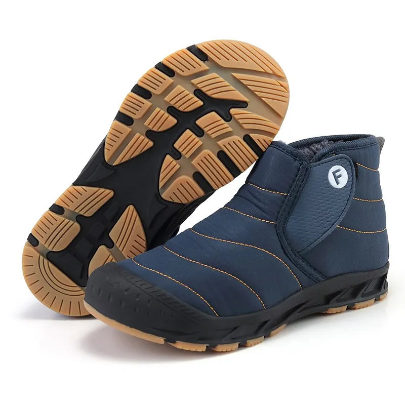 Callum snow boots in navy blue shown with textured rubber outsole