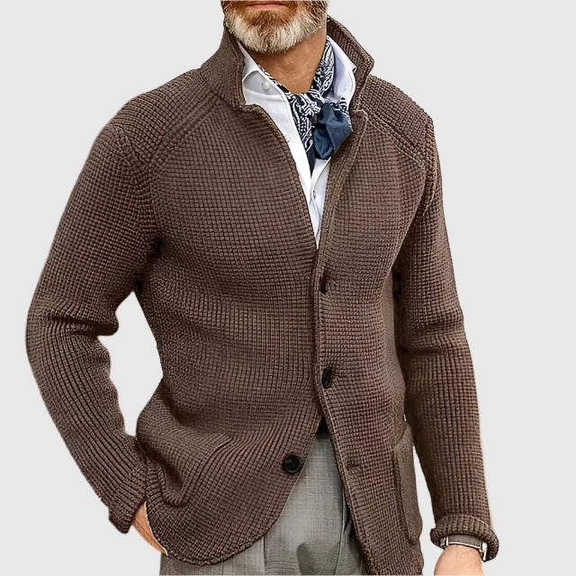 Man wearing dark brown stand collar button front knit cardigan, close-up