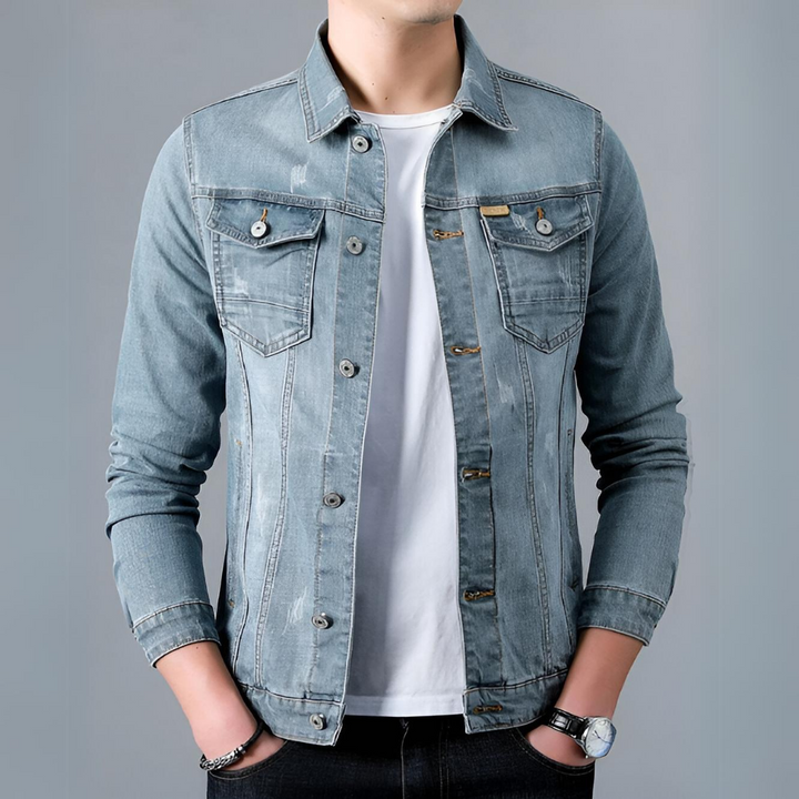 Jasper light grey wash denim jacket worn buttoned, front view with hands in pockets