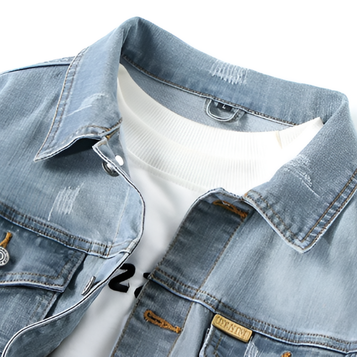 Close-up of jacket collar with fabric brand tab