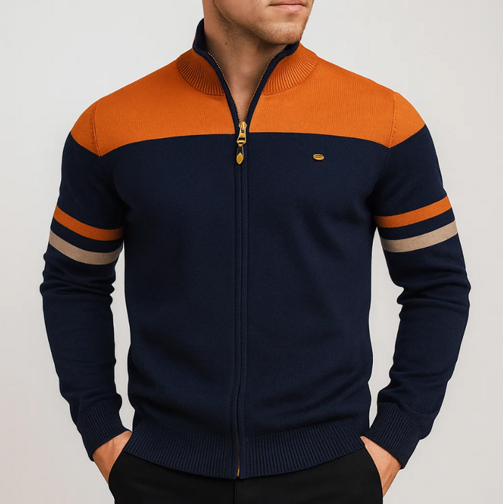 Man wearing Julian colorblock zip cardigan in navy and orange, close-up front view