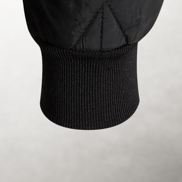Close-up of ribbed cuff detail on Julian bomber jacket
