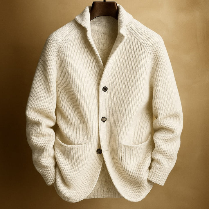 Marcus ribbed shawl collar cardigan in cream, front view on hanger