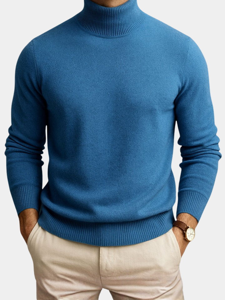 Nathaniel blue turtleneck sweater front view on model with hands in pockets