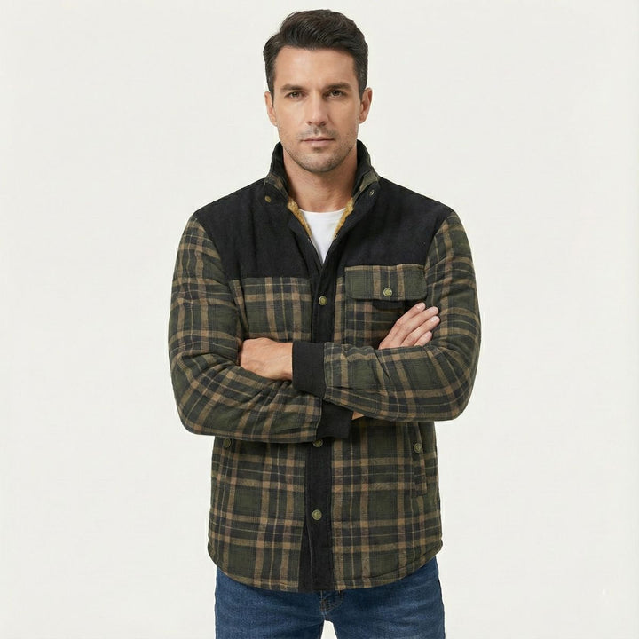 Rowan black and olive plaid shirt jacket, front view on model with arms crossed