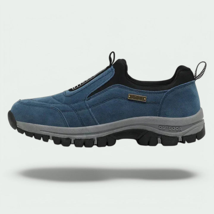 Thaddeus orthopedic slip-on walking sneaker in blue suede, side profile view