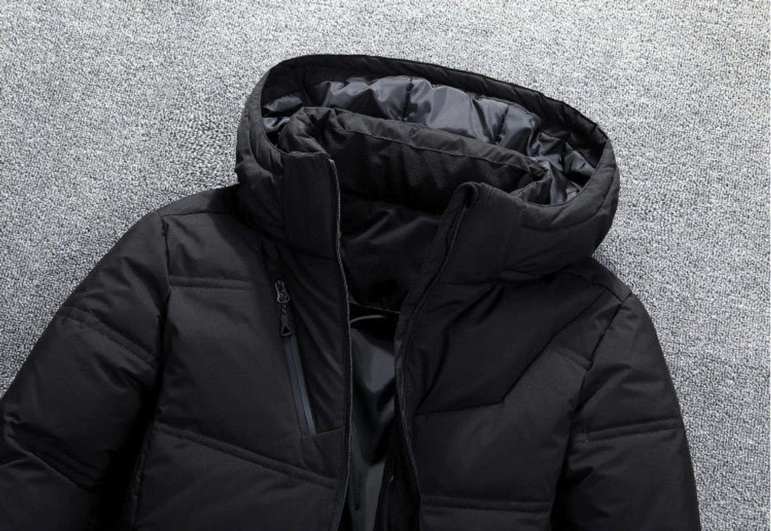Close-up of Vincent puffer jacket hood and zippered chest pocket
