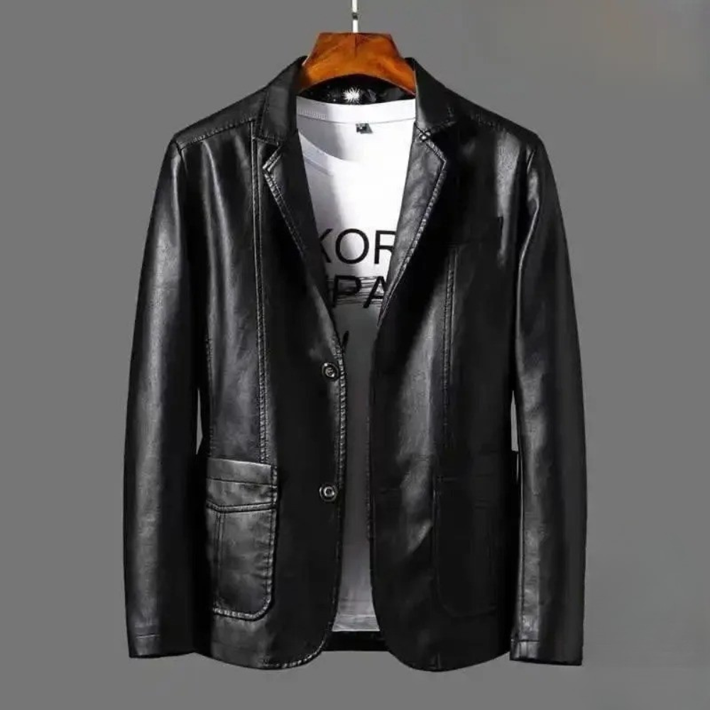 Black leather blazer close-up front view showing front pockets and button detail